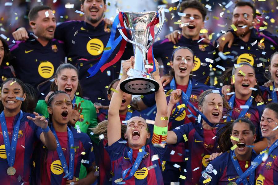 Barcelona's Alexia Putellas lifts the Women's Champions League trophy Barcelona's Alexia Putellas lifts the Women's Champions League trophy