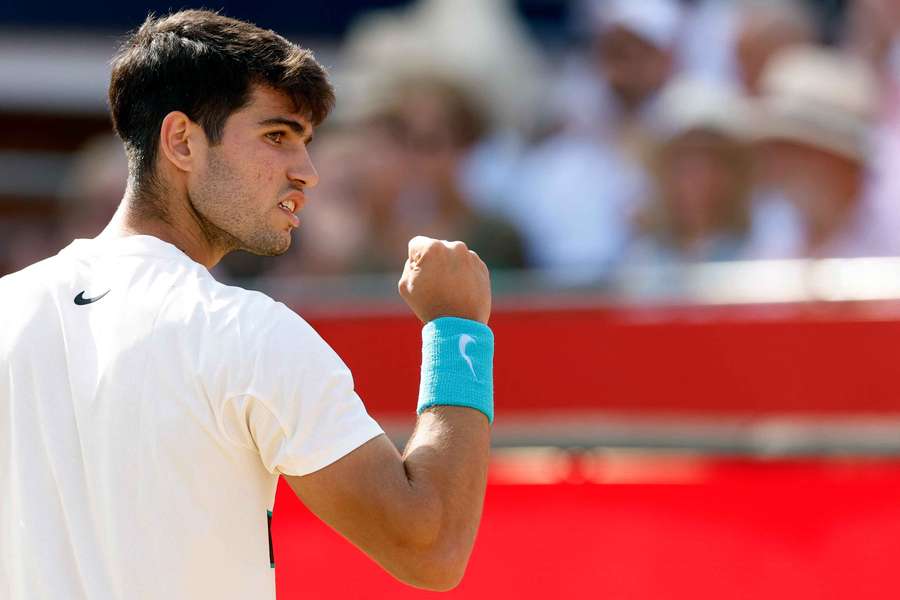 Spain's Carlos Alcaraz reacts during his match against Australia's Adam Walton at Queen's