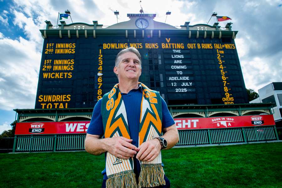 Former Wallaby Tim Horan poses in front of the Adelaide Oval's heritage listed scoreboard.