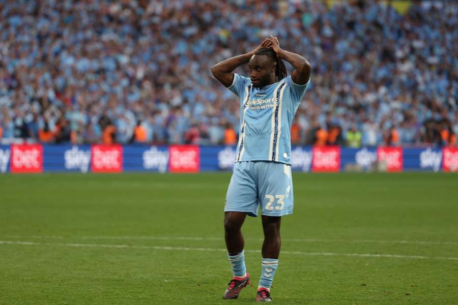 Fankaty Dabo reacts after missing the vital penalty in the shoot-out defeat against Luton Town at Wembley