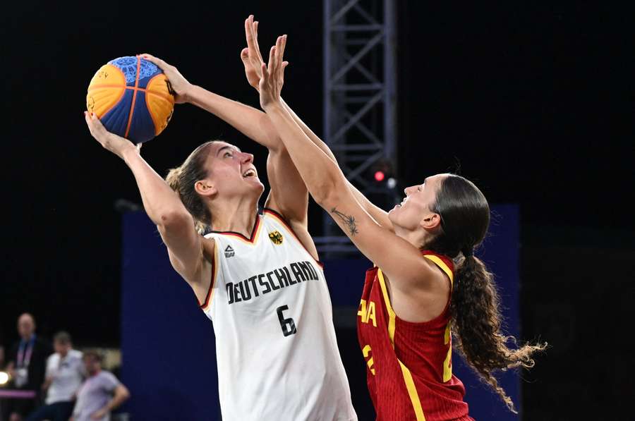 Marie Reichert of Germany in action against Juana Camilion of Spain