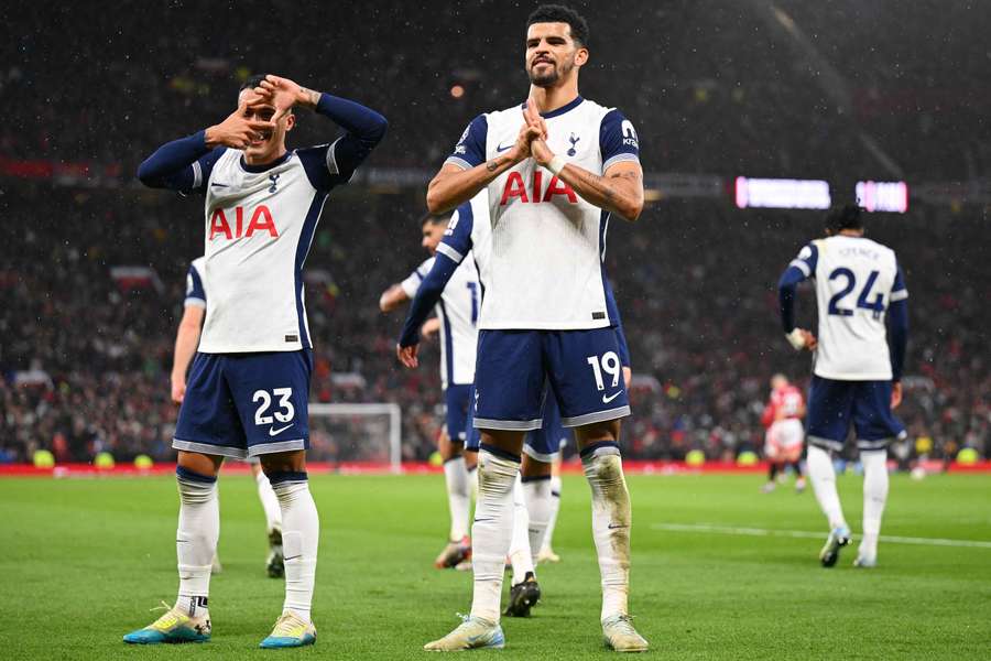 Dominic Solanke of Tottenham Hotspur celebrates scoring his team's third goal with teammate Pedro Porro