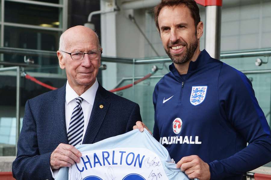 Sir Bobby Charlton was presented with a signed shirt by Gareth Southgate after a pitch was named in his honour in 2017