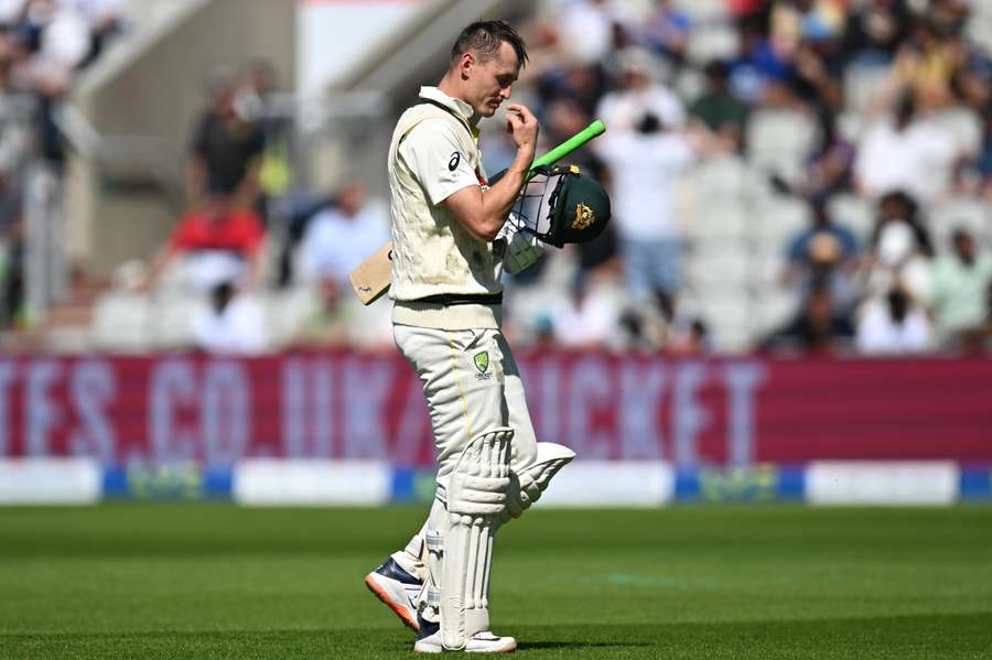 Australia's Marnus Labuschagne reacts as he walks back to the pavilion after losing his wicket for 51 runs