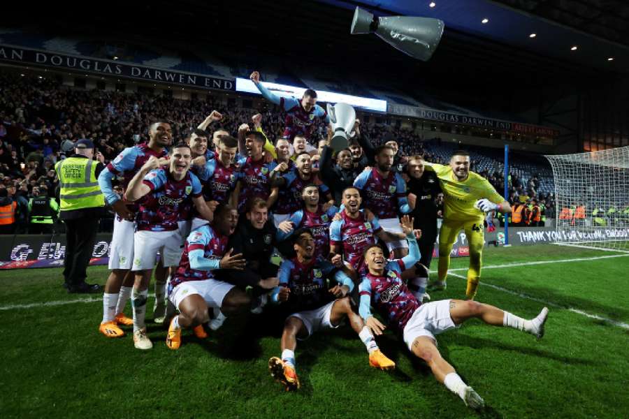 Burnley players celebrate after the match
