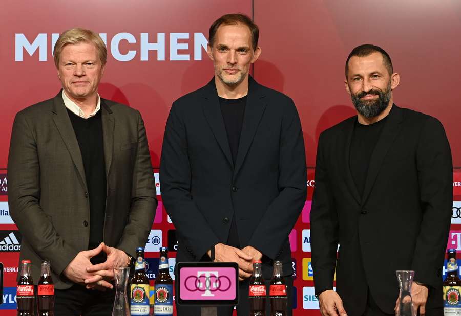 Bayern Munich's CEO Oliver Kahn, Bayern Munich's new headcoach Thomas Tuchel and Bayern Munich's Bosnian sporting director Hasan Salihamidzic pose for photos