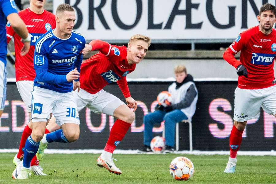 Marcel Rømer, Lyngby og P. Mattsson, Silkeborg IF under Superligakampen mellem Lyngby Boldklub og Silkeborg IF