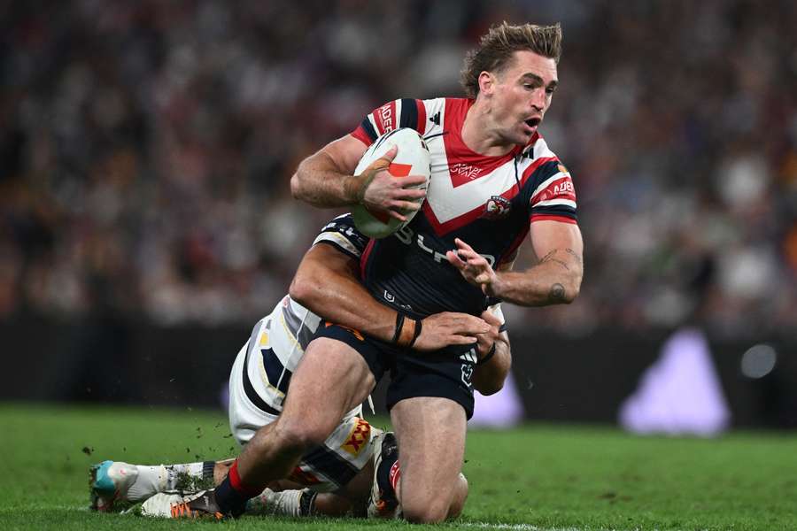 Connor Watson is tackled against the NQ Cowboys in Round 11.