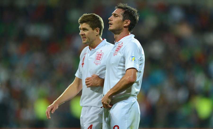 Steven Gerrard and Frank Lampard of England look on during the FIFA 2014 World Cup qualifier match between Moldova and England