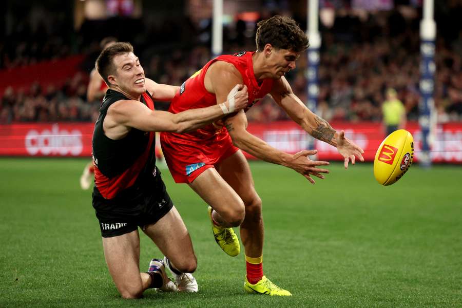 Essendon and Gold Coast will play twice in Round 24 after their Opening Round match was washed away by a tropical cyclone in March.