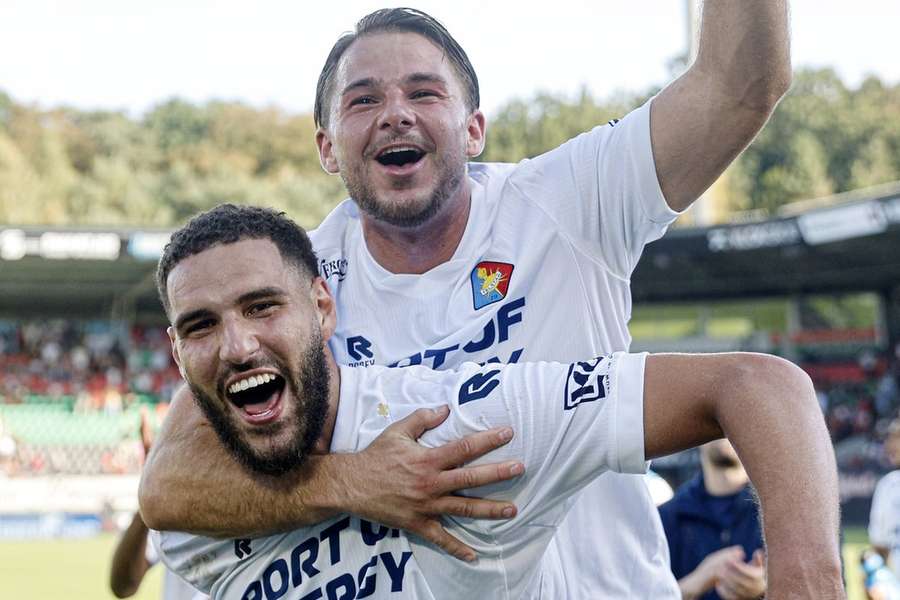 Telstar's Abdelnour Soualhia and Gabi Caschili celebrate the win over NEC