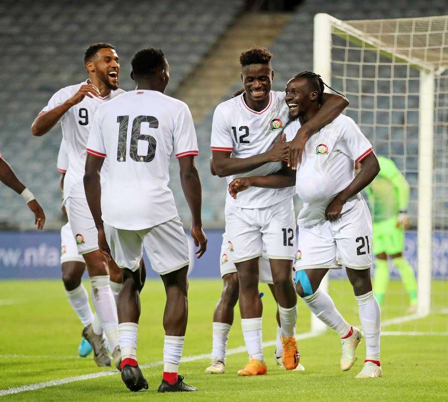 Kenya players celebrate against Namibia