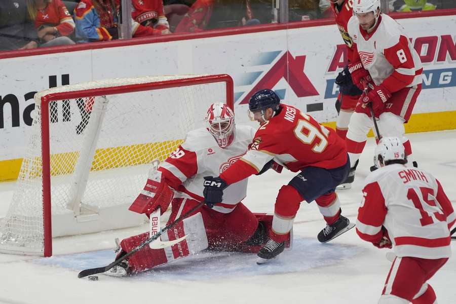 Detroit Red Wings goaltender Cam Talbot defends a shot by Florida Panthers left winger Tomas Nosek