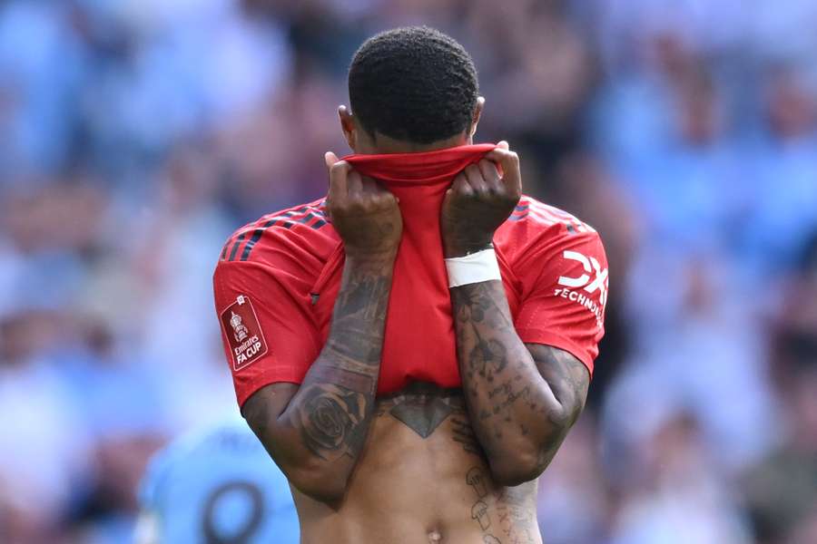 Marcus Rashford reacts after missing a chance