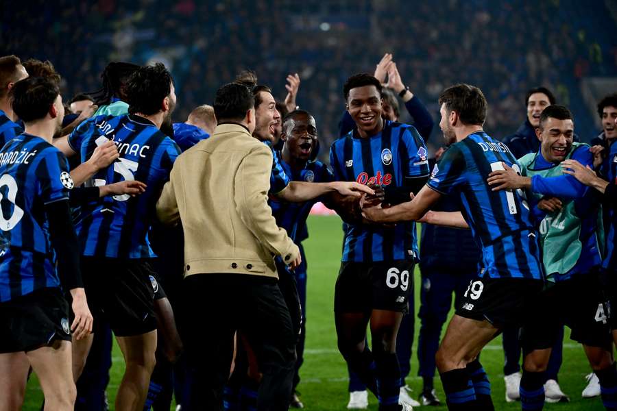 Atalanta celebrate their victory over Borussia Dortmund to advance to the Champions League last 16.