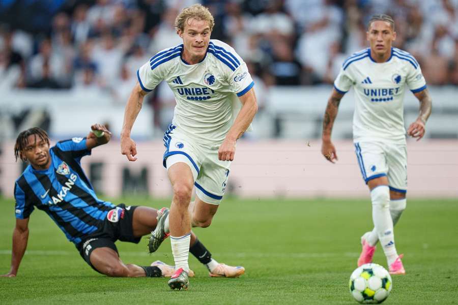 FC Copenhagen's Mads Emil Madsen surges past Inter Turku's Loic Essomba
