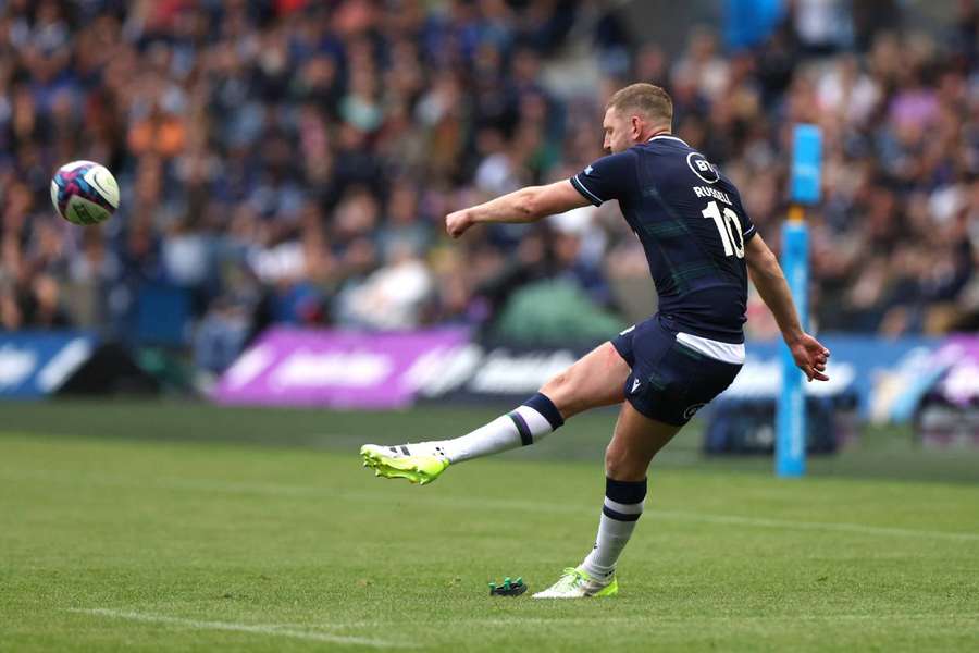 Russell in action with Scotland