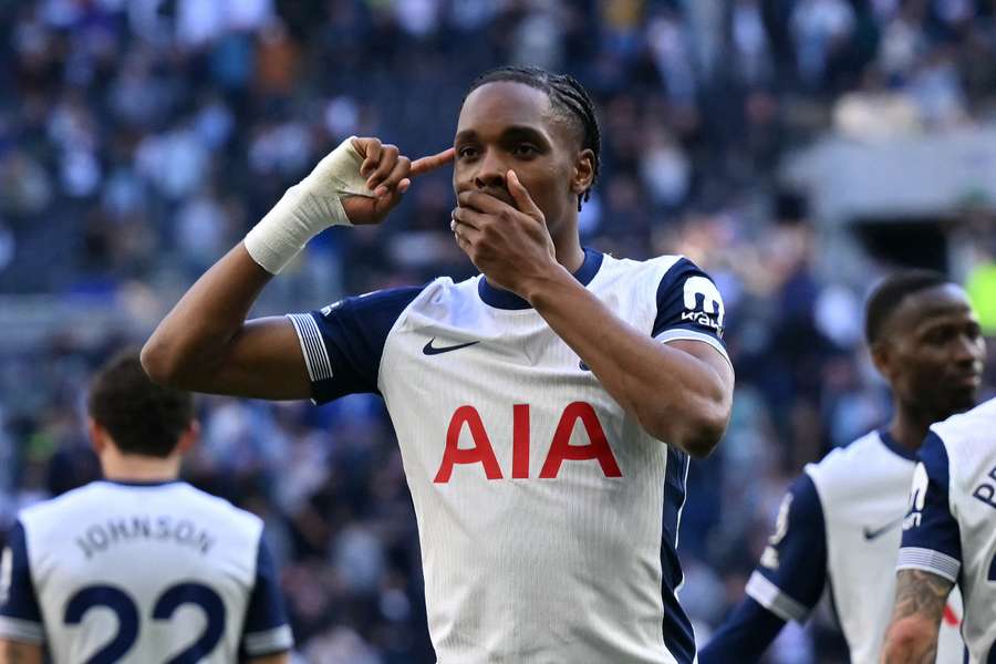Tottenham Hotspur's French striker #11 Mathys Tel celebrates scoring the team's third goal