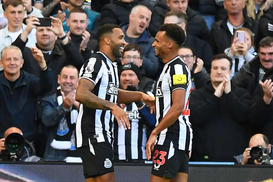 Newcastle United's English striker #09 Callum Wilson (L) celebrates with Newcastle United's English midfielder #23 Jacob Murphy