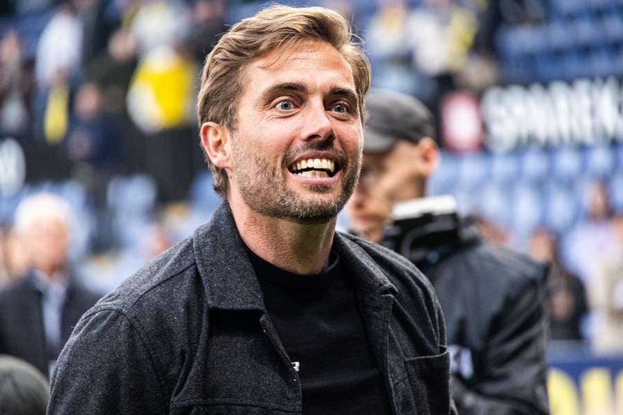 Jakob Poulsen of AGF celebrates with fans after winning the Danish title at Brondby stadium Jakob Poulsen of AGF celebrates with fans after winning the Danish title at Brondby stadium