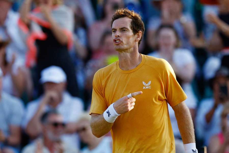 Murray celebrates after winning his second round match against France's Hugo Grenier 