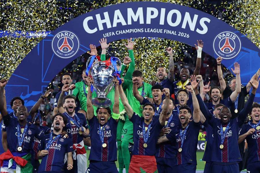 Paris Saint-Germain hoist the UEFA Champions League trophy after winning it for the second straight year. Paris Saint-Germain hoist the UEFA Champions League trophy after winning it for the second straight year.