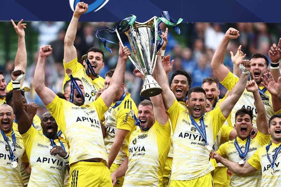 La Rochelle's players celebrate with the trophy after winning the European Champions Cup final