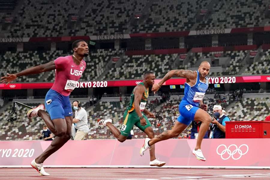 Lamont Jacobs (right) wins the Men's 100 metres at the Olympic Stadium on the ninth day of the Tokyo 2020 Olympic Games in Japan