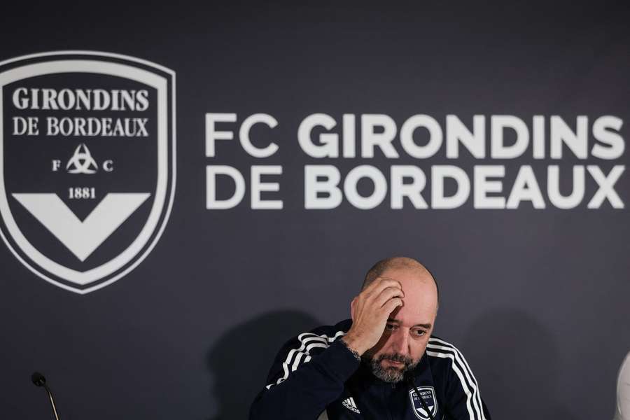 Gerard Lopez reacts during a press conference