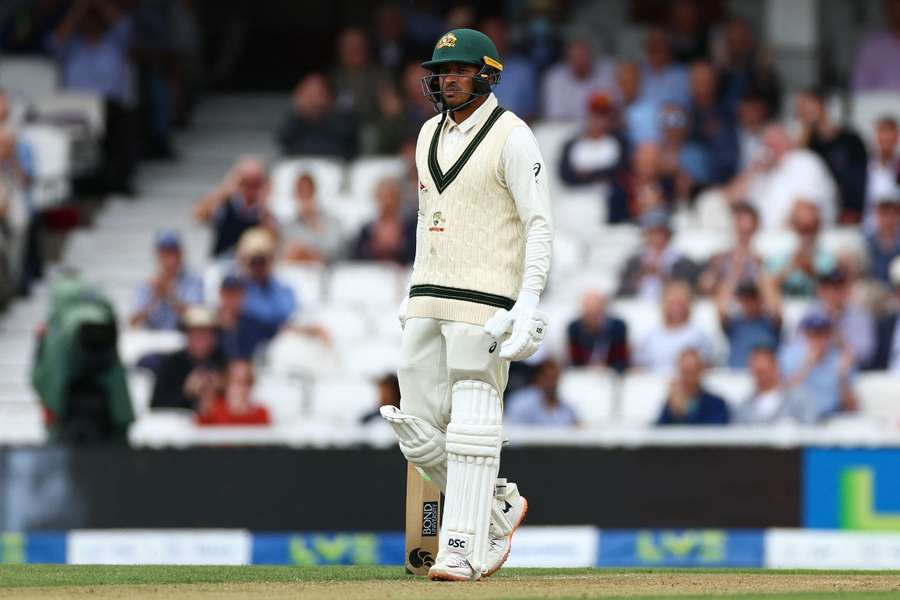 Australia's Usman Khawaja reacts after being given out for lbw