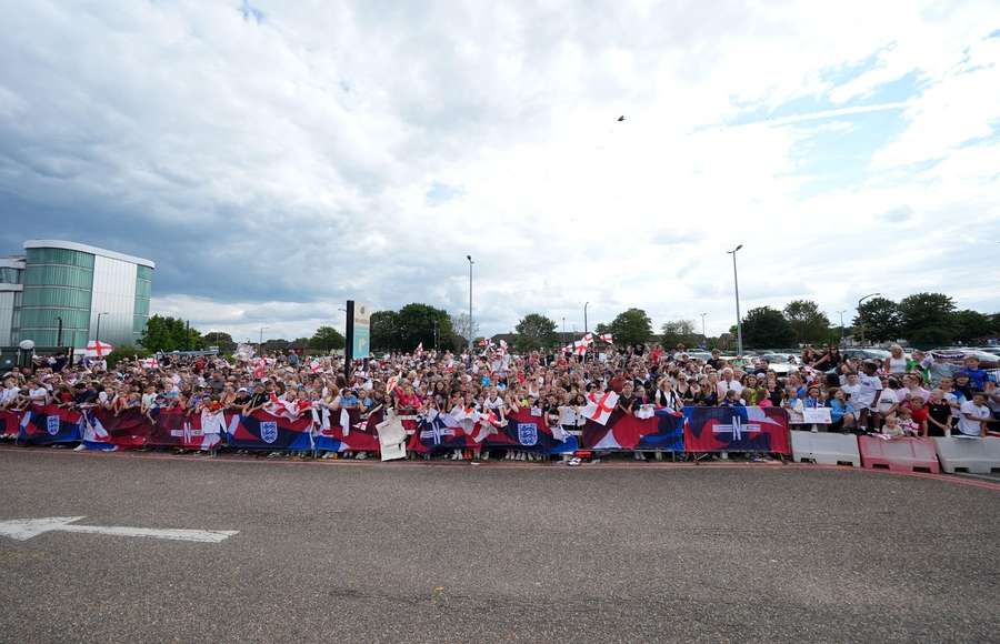 England fans are waiting outside the airport in London Southend England fans are waiting outside the airport in London Southend