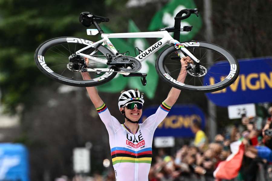 Pogacar celebrates after the win