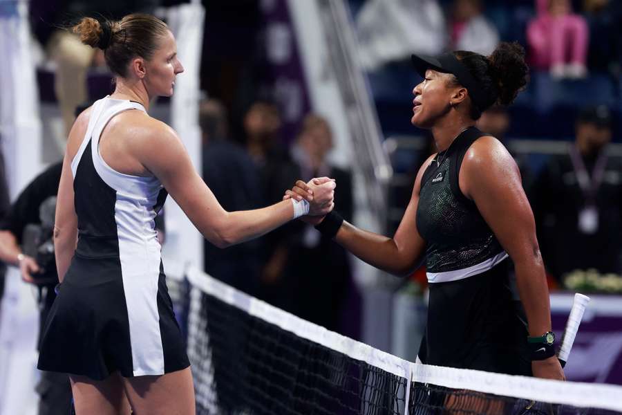 Karolina Pliskova of Czech Republic (L) greets Naomi Osaka of Japan after their match