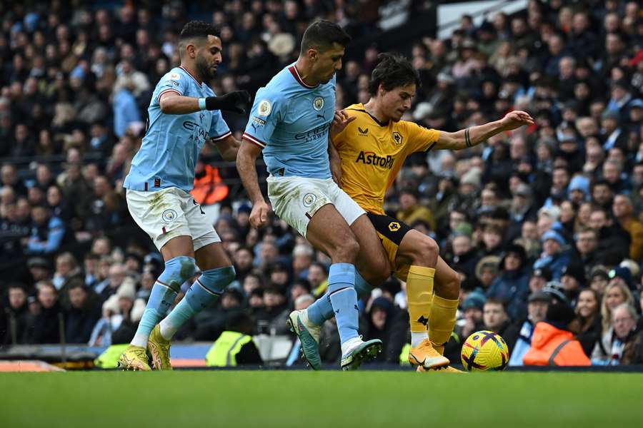 Rodri (C) in action against Wolves