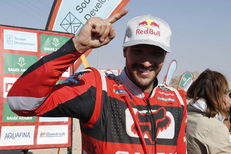 Sam Sunderland celebrates after stage 12 of last year's Dakar