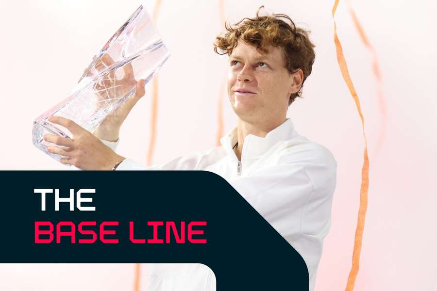 Jannik Sinner holds his trophy after winning his men's singles finals match against Jiri Lehecka