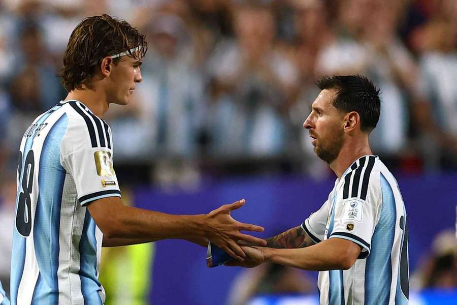 Nico Paz with Lionel Messi