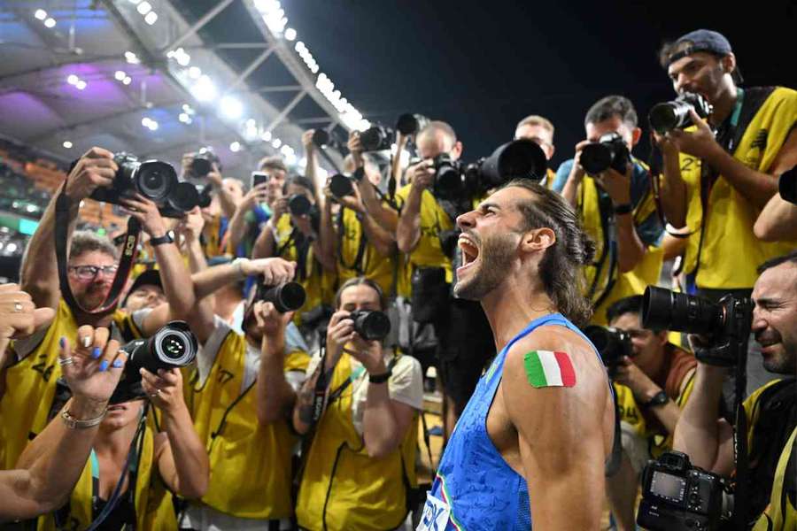 Gianmarco Tamberi celebrates winning the men's high jump final