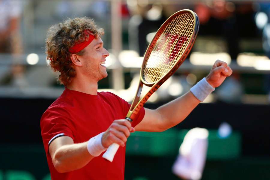 August Holmgren in action during a Davis Cup match August Holmgren in action during a Davis Cup match