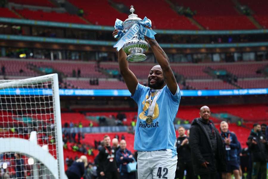 Antoine Semenyo with FA Cup trophy.