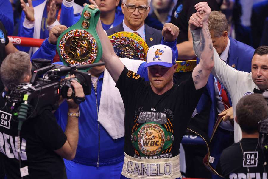 Mexico's Canelo Alvarez celebrates after unifying the super middleweight titles against Cuba's William Scull