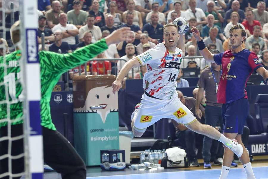 Magdeburg's Omar Ingi Magnusson in action against FC Barcelona's Emil Nielsen