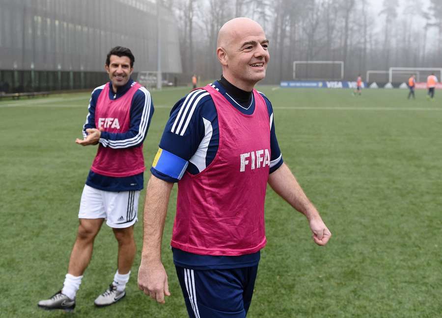 Figo (L) has been critical of Infantino Figo (L) has been critical of Infantino