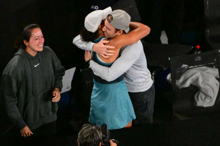 Keys embraces her husband after winning the Australian Open