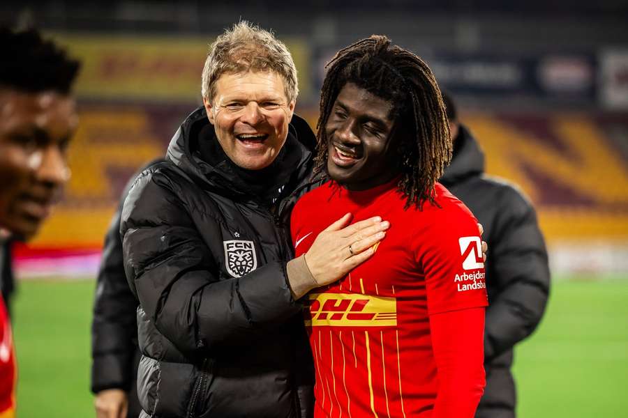 Head coach Jens Fonsskov Olsen, left, of FC Nordsjaelland seen with young star Caleb Yirenkyi