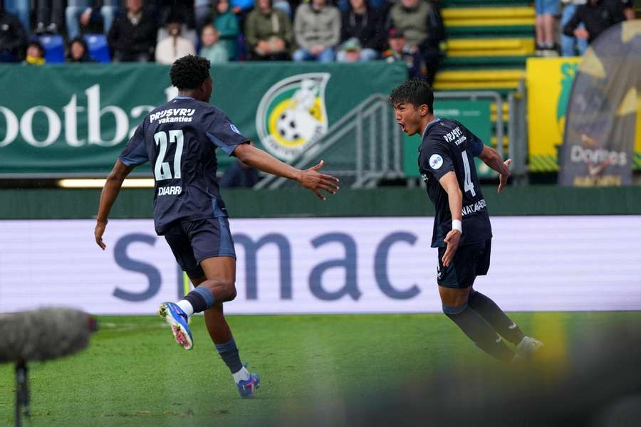 Feyenoord's Tsuyoshi Watanabe (R) celebrates scoring the 1-1 against Fortuna Sittard