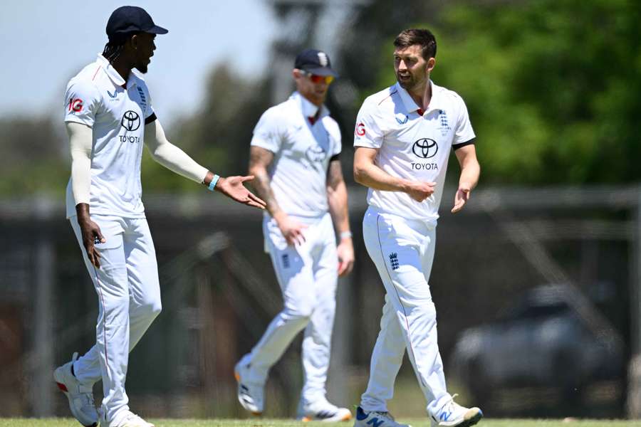 Jofra Archer and Mark Wood chat during England's Ashes warm-up game at Lilac Hill in Perth.
