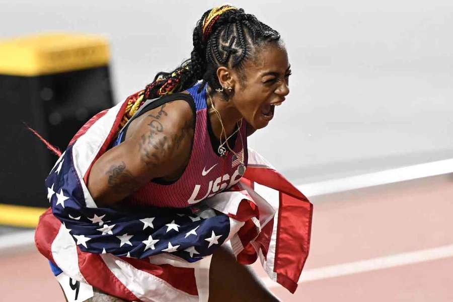 Sha'Carri Richardson celebrates after winning gold in the women's 100m