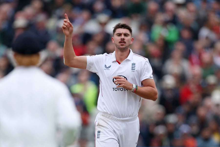 Josh Tongue celebrates taking a Pakistan wicket