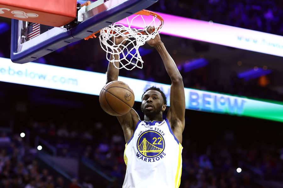 Golden State's Andrew Wiggins dunks on Philadelphia during the Warriors' 127-104 victory over the 76ers